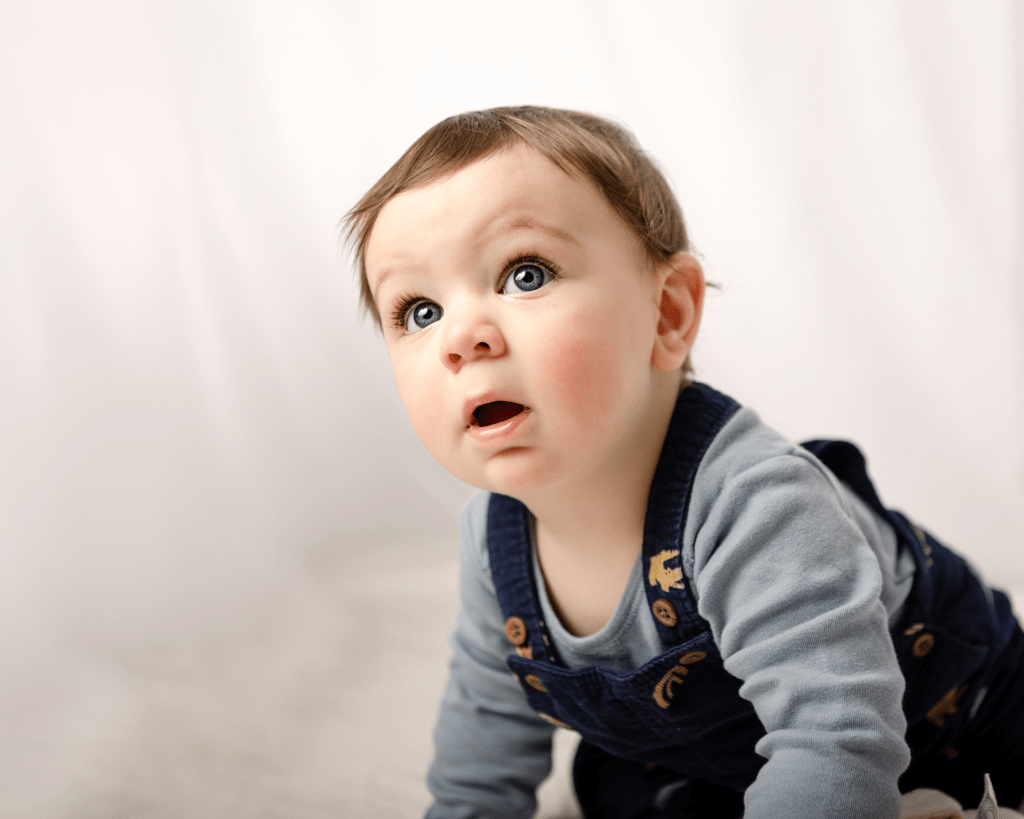 baby boy with huge gleaming eyes